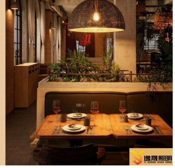 Large woven dome pendant in a concrete restaurant interior