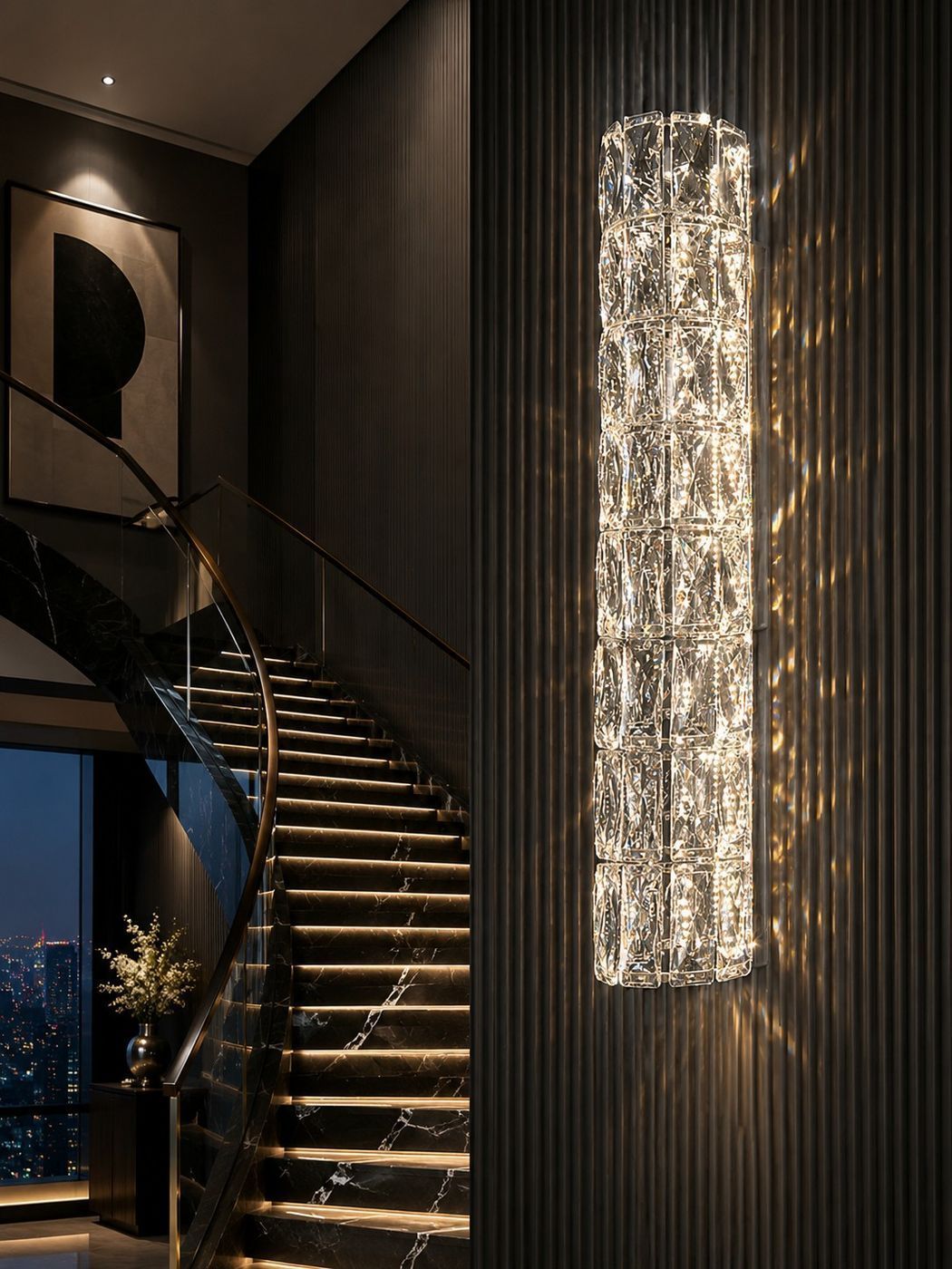 Crystal Column fixture mounted beside a staircase, catching the light